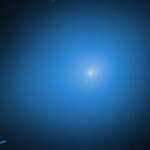 Un point lumineux lumineux éclaire une zone sombre autour de lui.