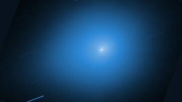 Un point lumineux lumineux éclaire une zone sombre autour de lui.