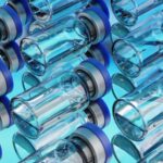 Lot of vaccine glass vials arranged in a rows on blue background, 3d rendering illustration.; Shutterstock ID 1906552987; purchase_order: -; job: -; client: -; other: