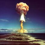 A mushroom cloud after the explosion of a French atomic bomb above the atoll of Mururoa, also known as Aopuni