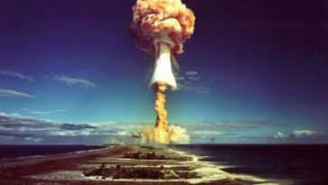 A mushroom cloud after the explosion of a French atomic bomb above the atoll of Mururoa, also known as Aopuni