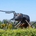 2R40KH8 Metal sculpture of a giant ant in the vineyard of the Huentala Winery in Tupungato, Valle de Uco, Mendoza, Argentina.