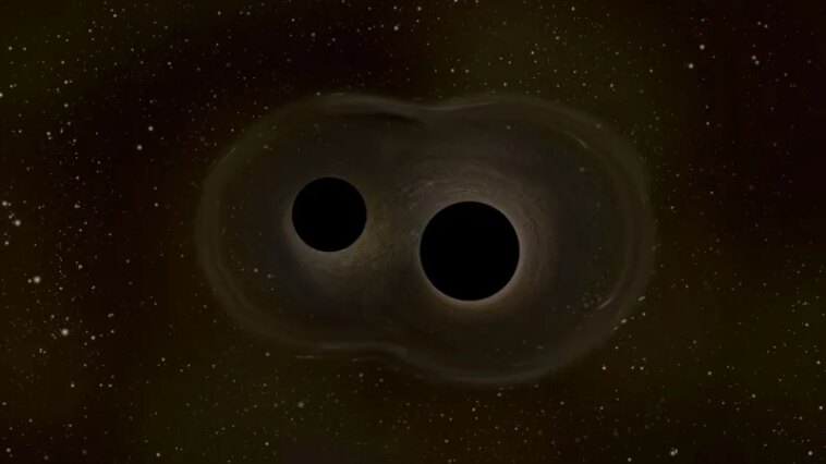 Les astronomes ont peut-être découvert une paire de trous noirs record
