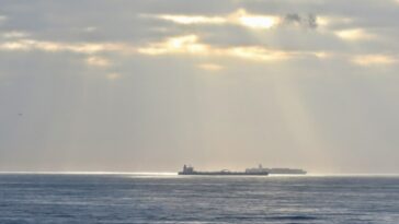 Oil tanker at anchor on open water