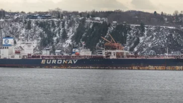 A crude oil tanker of the Belgian company Euronav on the Saint Lawrence at Quebec City, Quebec, Canada. Photo by Wilfredor, CC0 public domain dedication, modified, https://commons.wikimedia.org/wiki/File:Euronav_tanker_on_the_Saint_Lawrence_at_Quebec_City.jpg