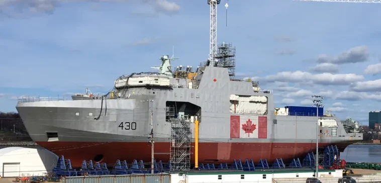 HMCS Harry DeWolf, lead vessel in class, under construction in the Halifax Shipyard, May 2018. Photo by WayeMason, CC BY-SA 4.0, modified, https://commons.wikimedia.org/wiki/File:HMCS_Harry_Dewolf_under_construction_May_2018.jpg