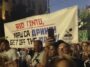 Protesters carry a