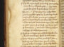 Une vieille page d'un livre, avec une écriture indéchiffrable d'aspect médiéval