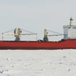 The cargo ship Kapitan Danilkin outside Sabetta, Russia, April 2015. Photo by Tuomas Romu, CC BY-SA 4.0, modified, https://commons.wikimedia.org/wiki/File:Kapitan_Danilkin_April_2015.jpg