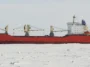 The cargo ship Kapitan Danilkin outside Sabetta, Russia, April 2015. Photo by Tuomas Romu, CC BY-SA 4.0, modified, https://commons.wikimedia.org/wiki/File:Kapitan_Danilkin_April_2015.jpg