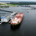 The oil terminal at the Port of Primorsk, Leningrad Oblast, Russia, June 2014 (Photo by Tara17 tara17), CC BY-SA 4.0, modified, https://commons.wikimedia.org/wiki/File:%D0%9F%D0%BE%D1%80%D1%82_%D0%9F%D1%80%D0%B8%D0%BC%D0%BE%D1%80%D1%81%D0%BA.jpg