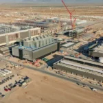 TSMC Fab 21 under construction in Phoenix, Arizona, November 5, 2023 (Hunter Trick), CC BY-SA 4.0, modified, https://commons.wikimedia.org/wiki/File:231105-1_TSMC_Fab_21_construction.jpg